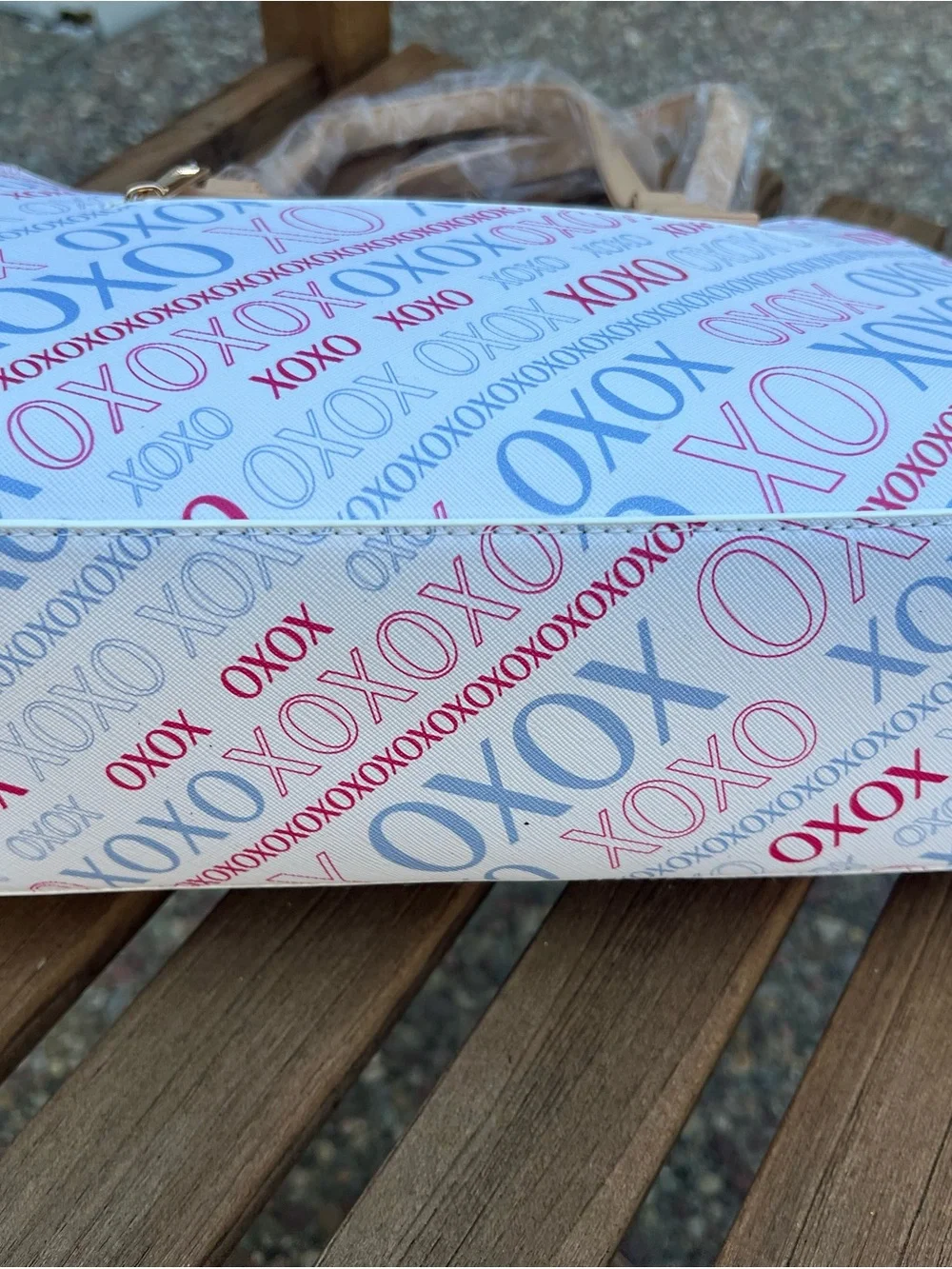 XOXO White Satchel with Blue and Red Logo Print and Tan Trims